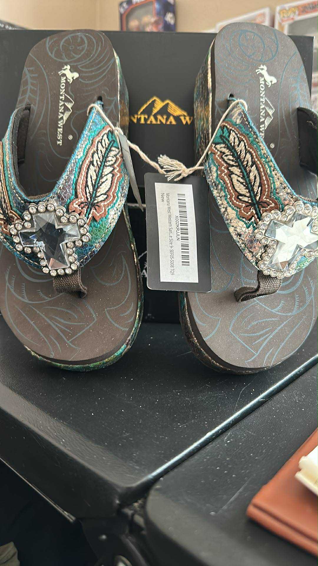 Feather with a Cross in the center Flip Flops SIZE 9